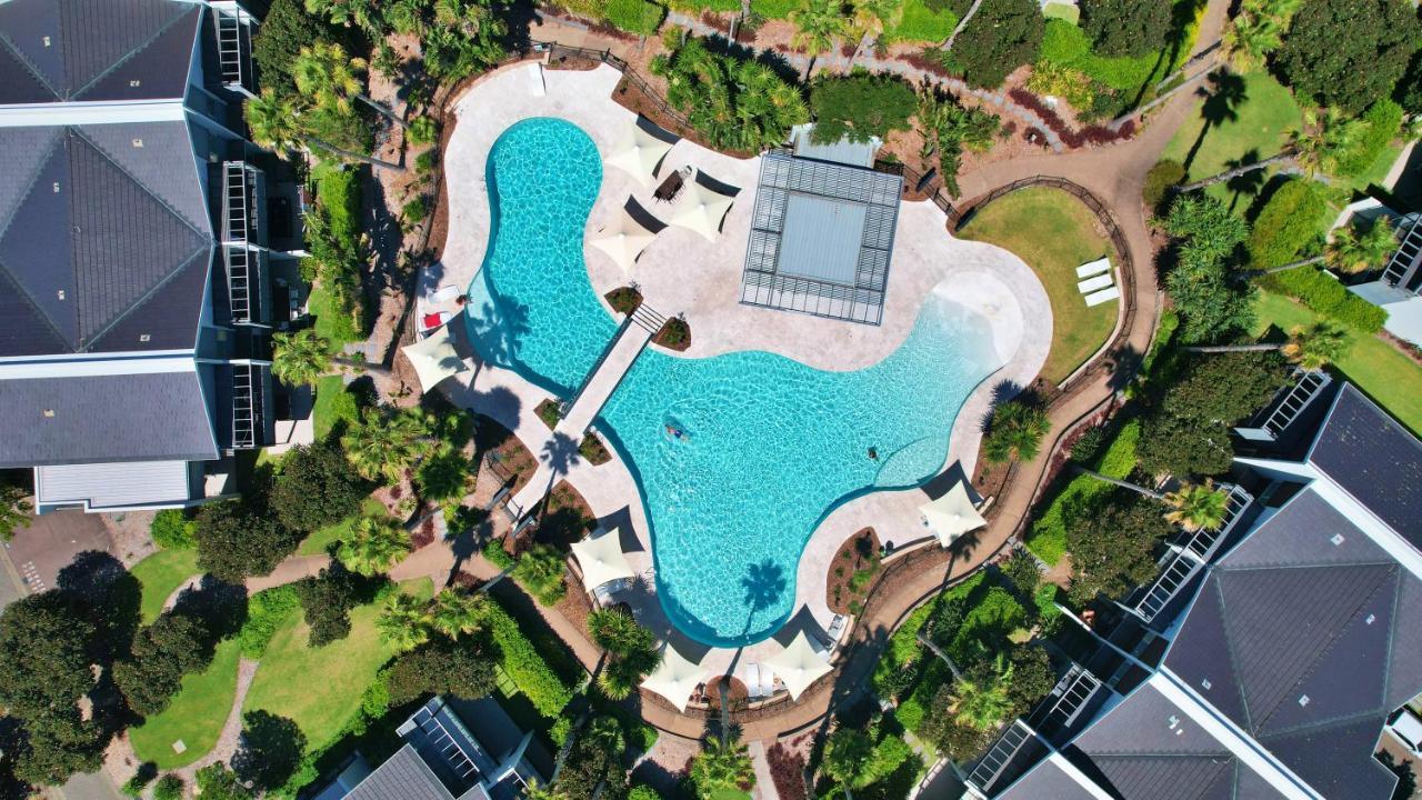Pullman Magenta Shores Resort Entrance Exteriér fotografie Aerial view of the pool at the 2018 Commonwealth Games