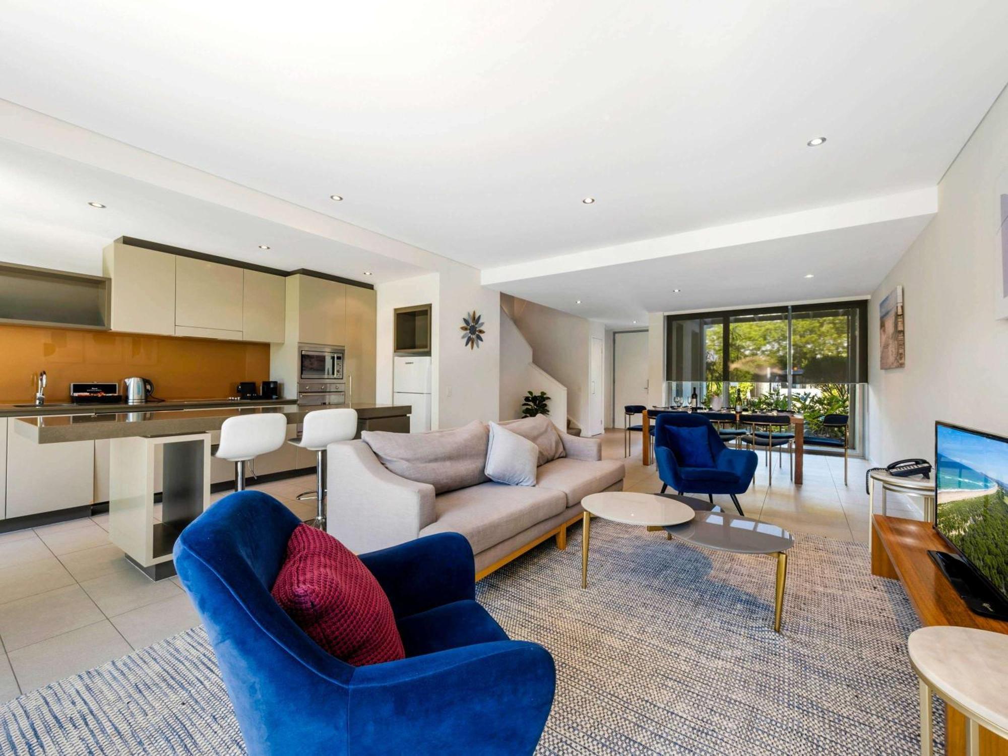 Pullman Magenta Shores Resort Entrance Exteriér fotografie A living room in a typical apartment